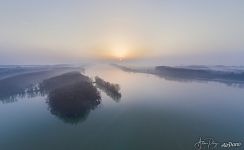 The Danube and its golden crown on a misty morning